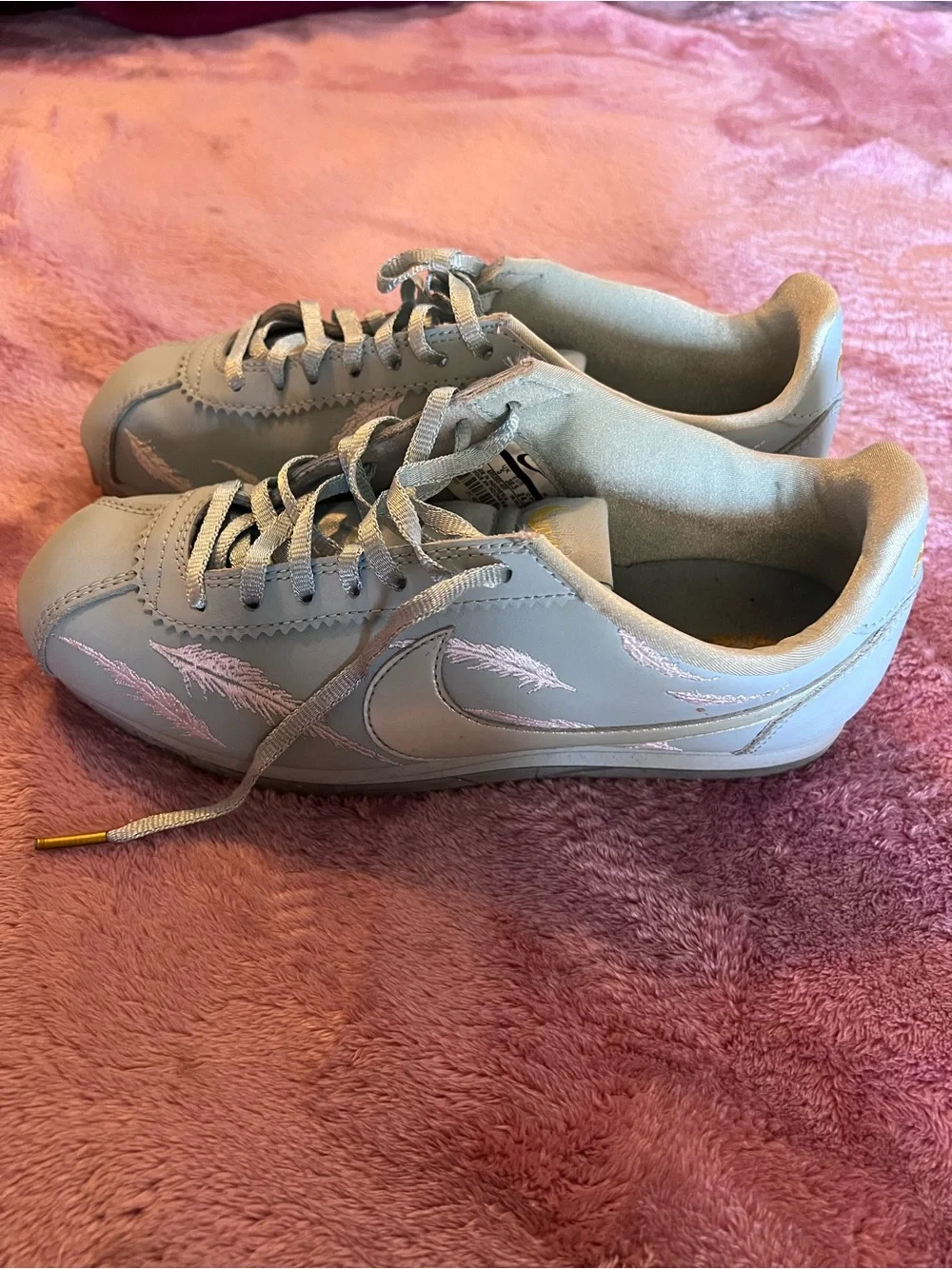Nike Light Blue Cortez Sneakers with Pink Feather Stitching